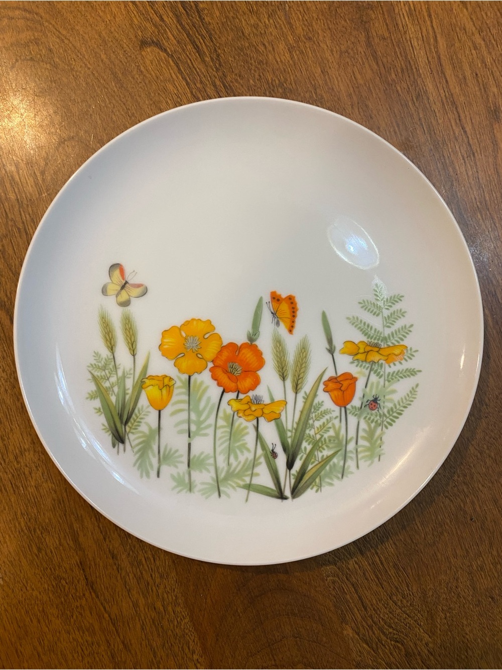 White Ceramic Dinner Plate with Orange & Yellow Poppy Floral Motif